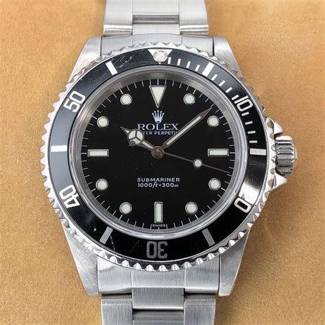 rolex submariner 14060 swiss only dial|Rolex 14060 swiss only dial.